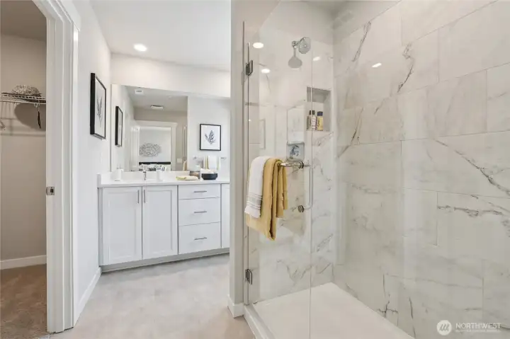Primary bath with dual sinks and walk in shower Primary bath with dual sinks and walk in shower