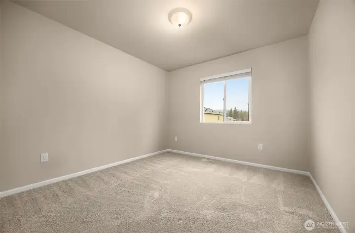 Upstairs bedroom with walk in closet.