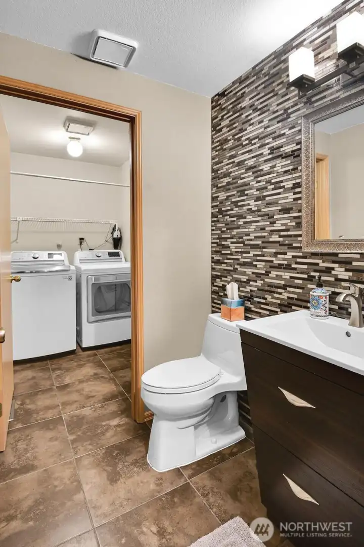 Main floor half bath & utility room