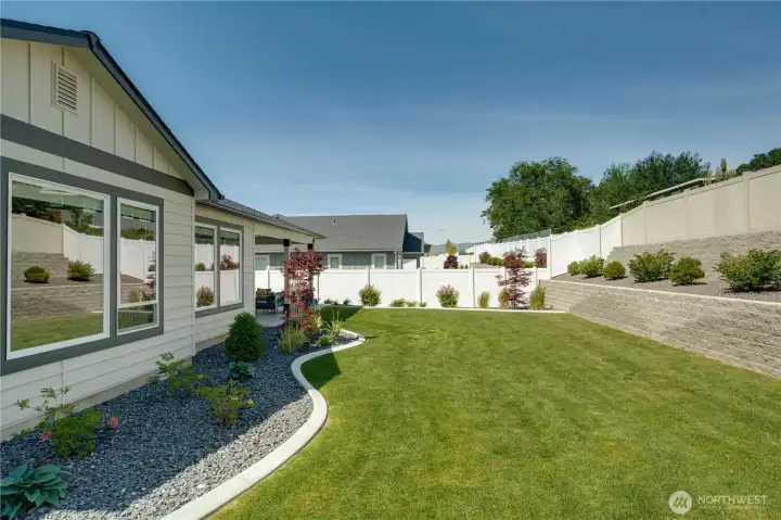 Well Manicured Yard with  Curbing