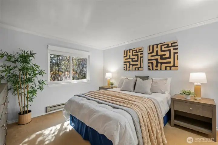 Primary bedroom with views over backyard