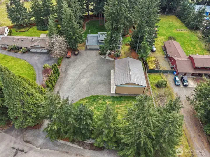 Hard to find manicured 1 acre property.