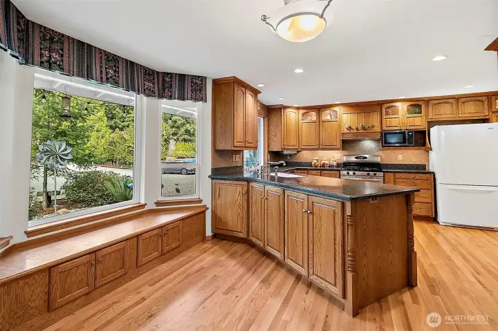 Once inside you are greeted by a huge bay window and a wonderful extra large kitchen