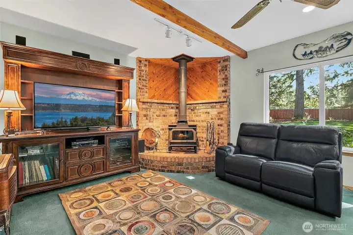 Family room has cozy wood burning stove