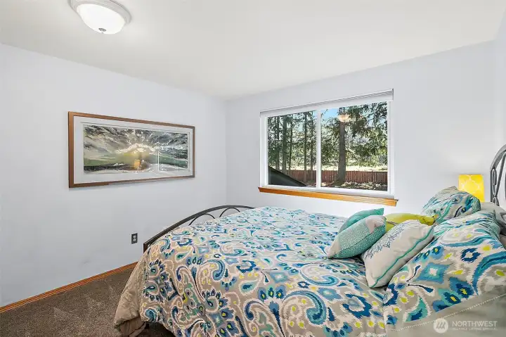 Bedroom overlooks beautiful back yard