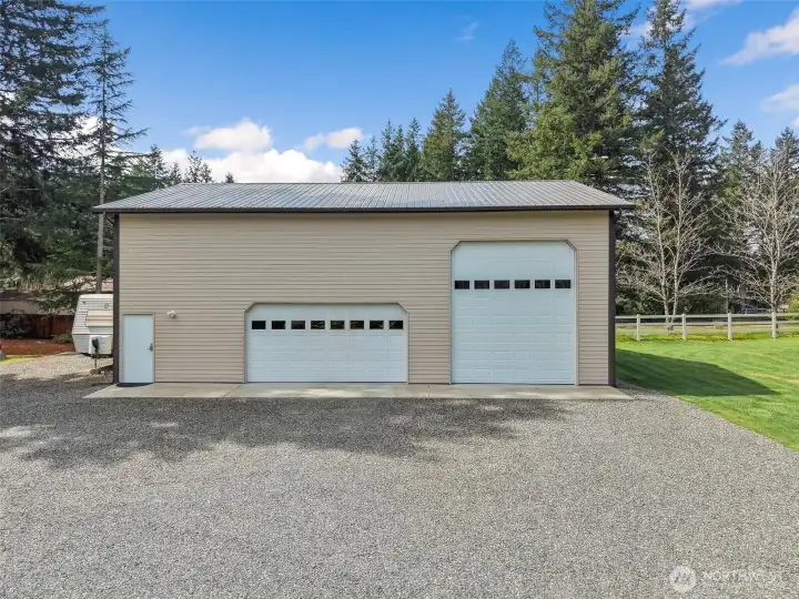 36' deep x 48' long this amazing pole barn awaits!  Insulated, power, water (no septic), & reinforced concrete for potential car lift