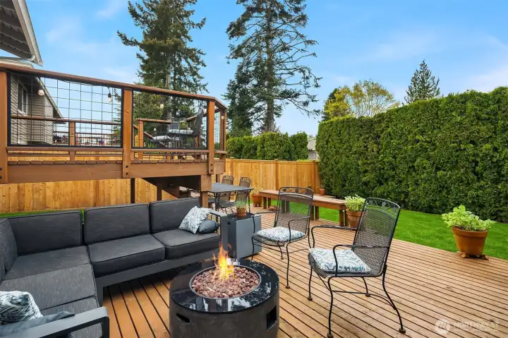 Lower deck and upper deck overlooking the serene backyard