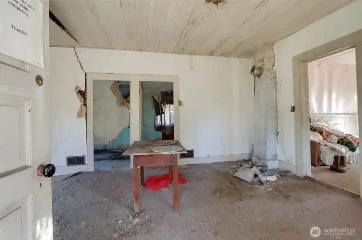 Enter into Living Room. Doorways to 2 bedrooms.