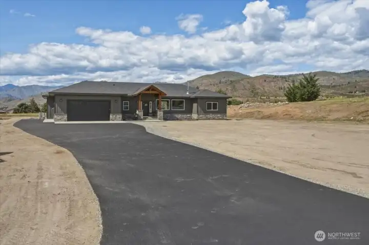 Long driveway leading to home