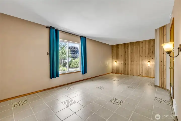 Extra Lrg. 3rd Bedroom w/ Tiled floor and wood accent walls