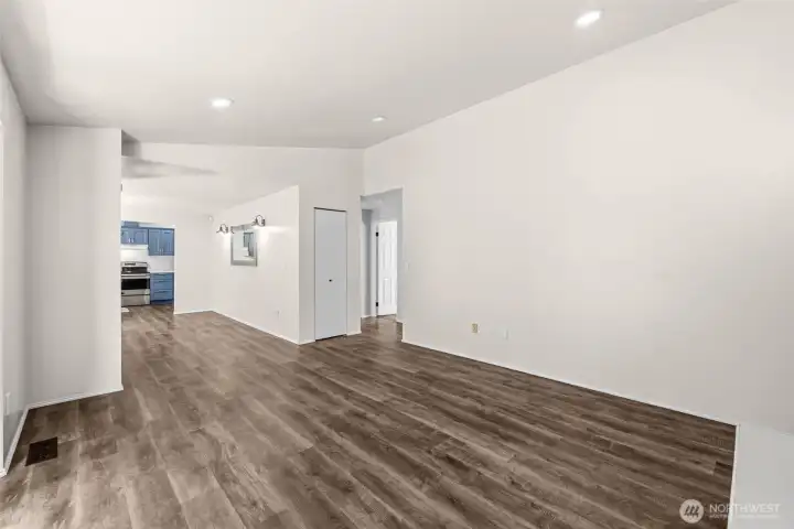 The hallway leads from the entry into the back of the home where the bedrooms, laundry and slider to back yard are located.