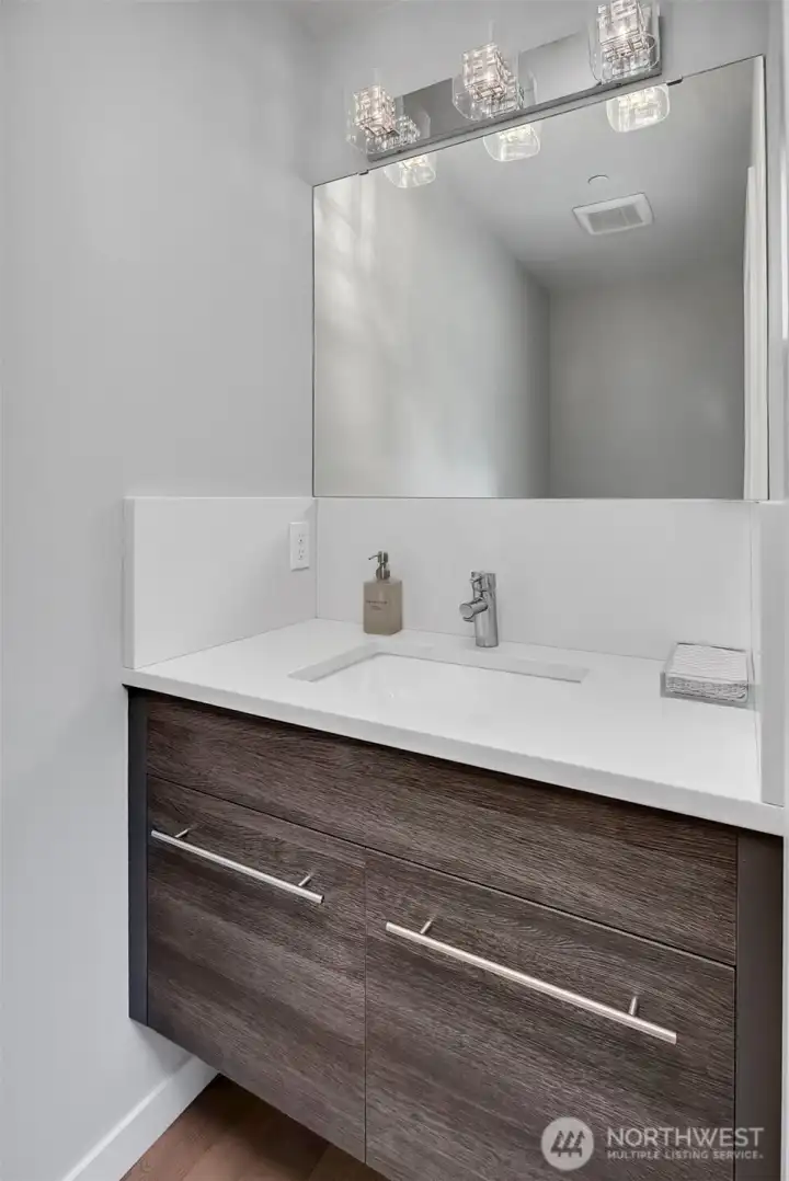 Main floor powder room. All other baths in the house are full baths! For 4.5 baths total Main floor powder room. All other baths in the house are full baths! For 4.5 baths total