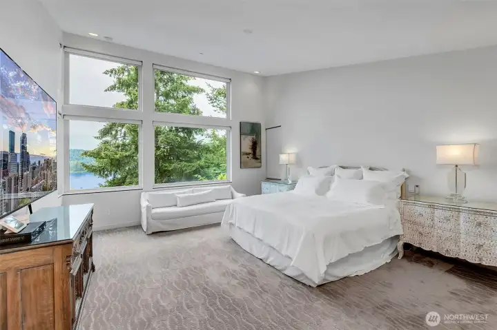 Primary suite has beautiful views, walls of glass, automatic shades and vaulted ceilings. Oversized and absolute perfection. Primary suite has beautiful views, walls of glass, automatic shades and vaulted ceilings. Oversized and absolute perfection.