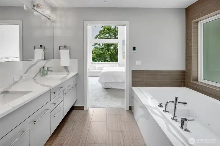 The bath rivals any 5-star resort with large soaking tub, walk in shower, slab quartz and double vanity. The bath rivals any 5-star resort with large soaking tub, walk in shower, slab quartz and double vanity.