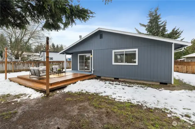 New wood deck & partial view of back & West side yards.