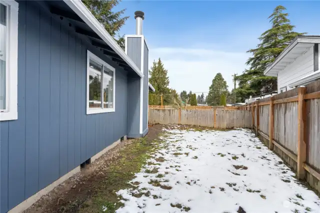 Mostly fenced dog run on this East side of the home.  Dog run just needs a gate at the deck entrance.