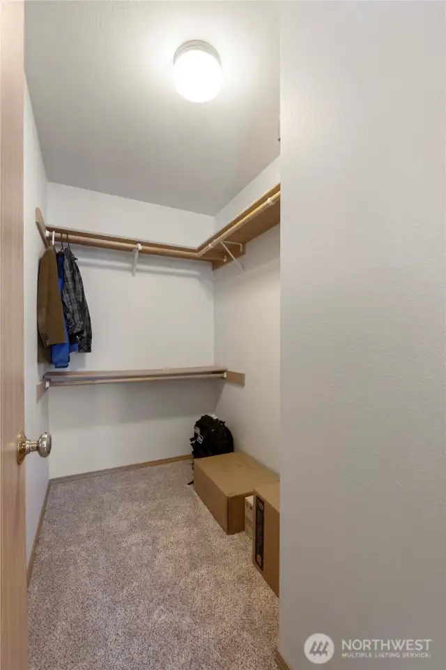 Large primary bedroom walk-in closet.
