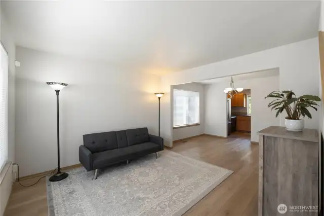 As you walk into the home, the living room is to your left.