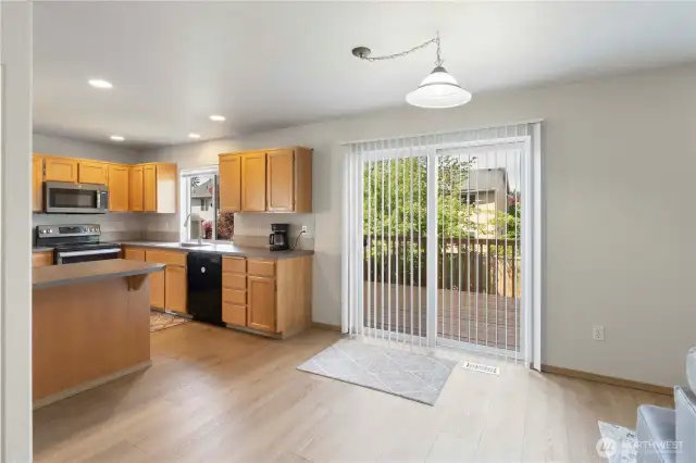 Between the kitchen and family room is an informal dining area.