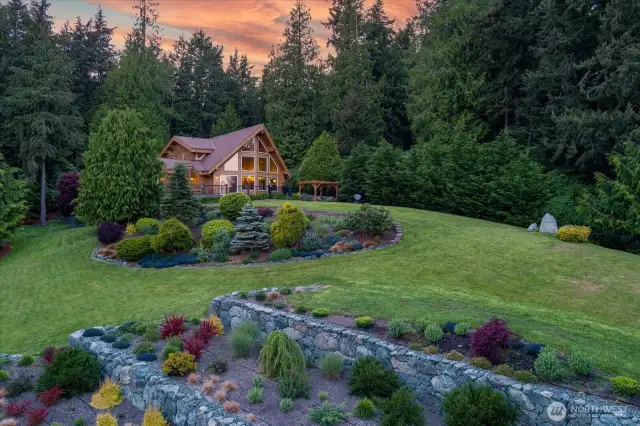 Private, parked out estate perched on almost 3 acres.
