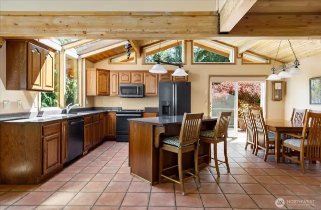 Living room flows to open, light filled kitchen.