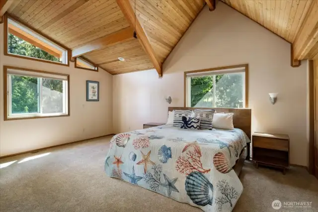 Primary suite is spacious yet cozy.