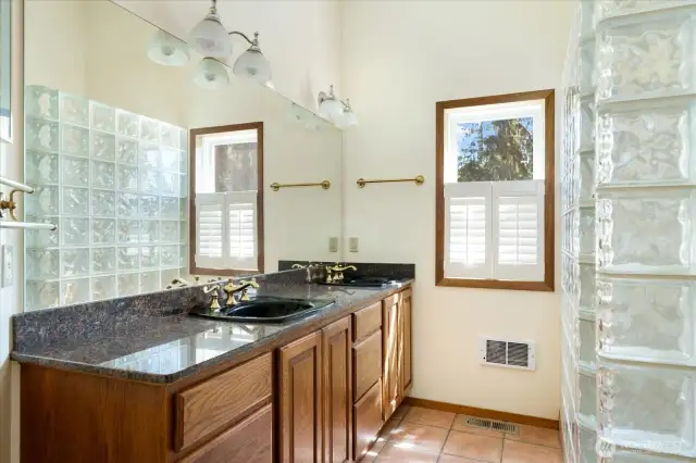 Spacious primary ensuite bathroom.