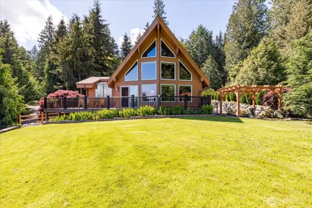 Ample level grassy area right off the front of the home.