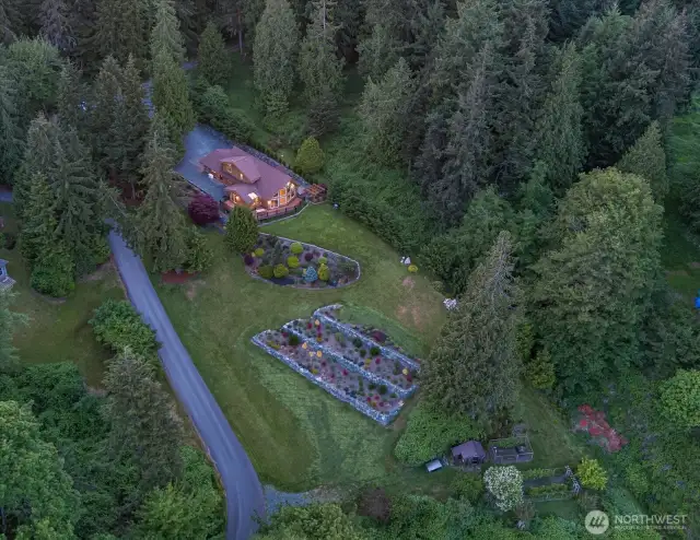 Thoughtfully planned garden beds with drought resistant and native plantings.