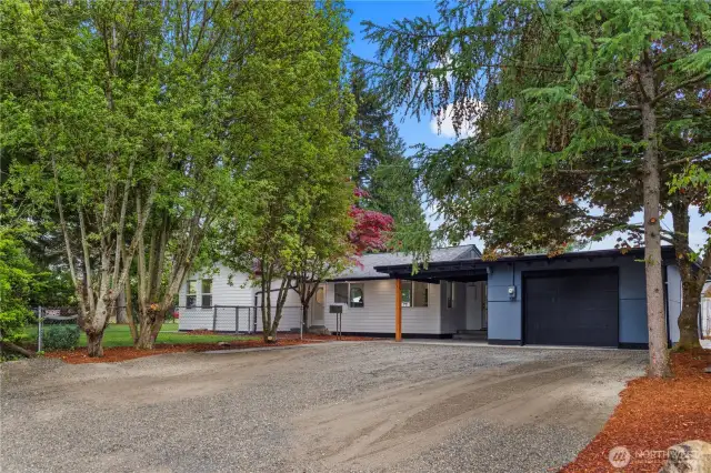 Welcome to this beautifully updated rambler in Tacoma!