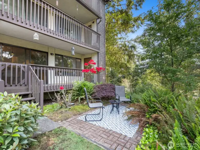 Enjoy your morning coffee or unwind in this tranquil spot.Stairs down from deck to  private patio area