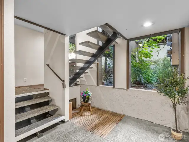 Down stairs to private landing area- make this area yours.