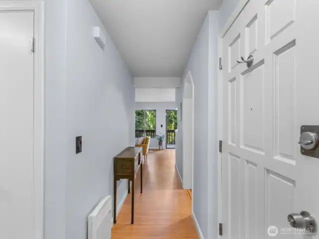 Welcome home! Hallway taking you to kitchen and living space.