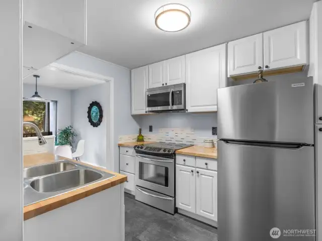 All new appliances and  custom cabinets and vinyl plank flooring
