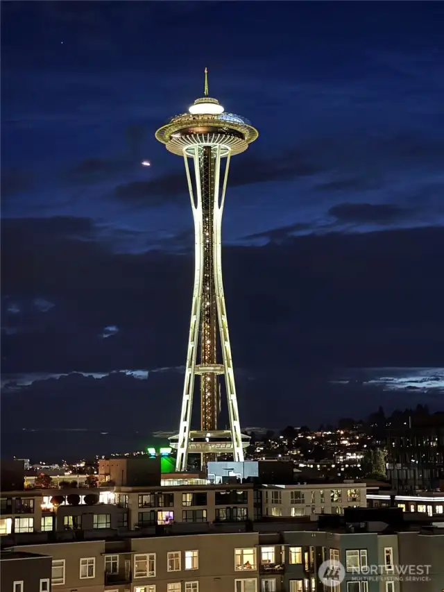 This view is yours to enjoy. Space Needle at night. Seller took photo from this balcony.