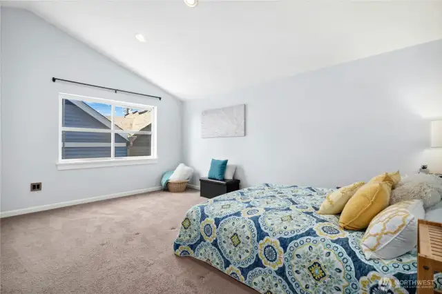 Spacious Primary Suite with vaulted ceilings