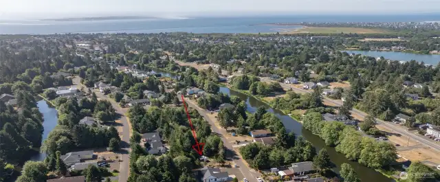 Everything you need in one peaceful lot: gravel pad, trees for shade, privacy fence, and full water, sewer, and electric hookups. Just pull in and relax.