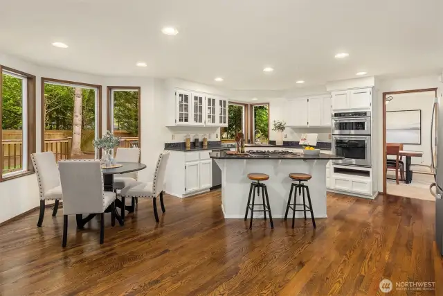 Nook and breakfast bar offer additional seating space for informal gatherings