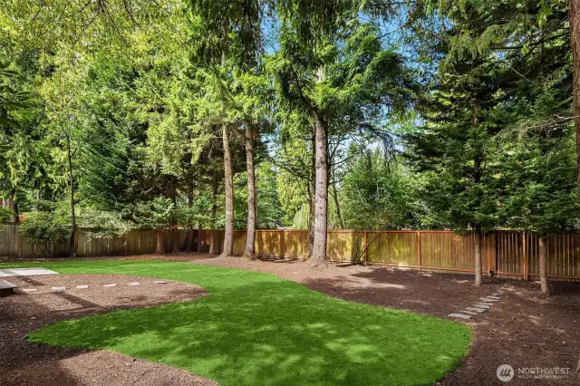 Level, private and fully fenced rear yard offers plenty of space to play or garden