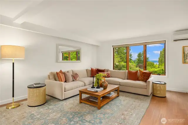 Enjoy west facing views of the mountains and water all day!