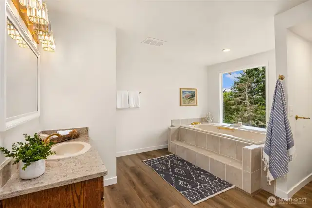 Primary bath with soaking tub.