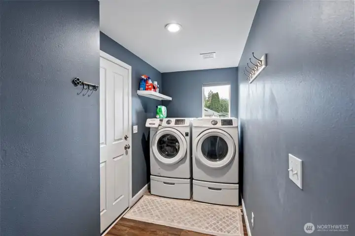 Laundry room/mud room. Door to garage