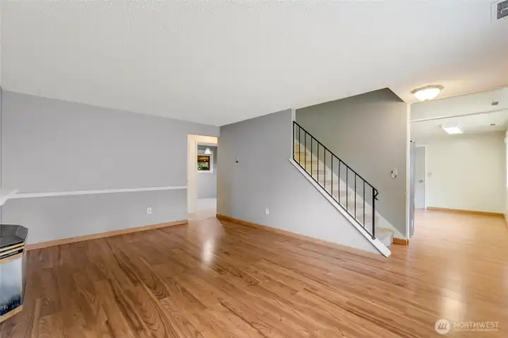 Stairs lead to two bedrooms upstairs