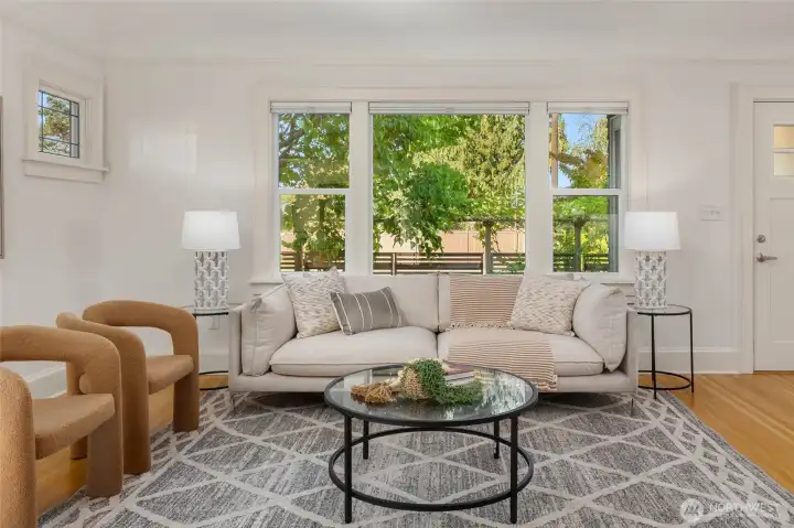 Filtered privacy from custom blinds, trees and signature fence.