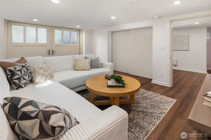 Truly a unique customization of the home. Ceiling mounted panels slide to open the room up or close it for privacy. Frosted glass double doors bring in soft light.