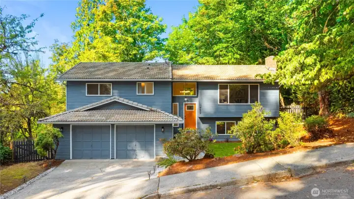 The front of your new home is welcoming with new landscaping and plenty of room to park.