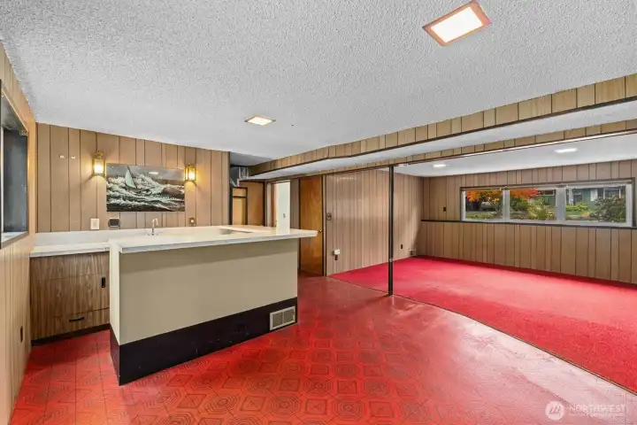 Downstairs you'll find this extra large rec room, family room, play space, workout space, whatever meets your needs complete with wet bar!