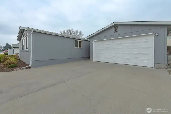 Two car garage and deep driveway.