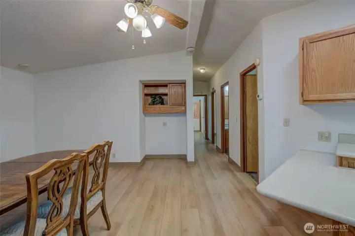 Dining room to the left and kitchen with eating bar to the right. Bedrooms straight ahead.