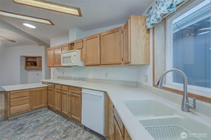 Functional kitchen with lots of counter space and cabinets.